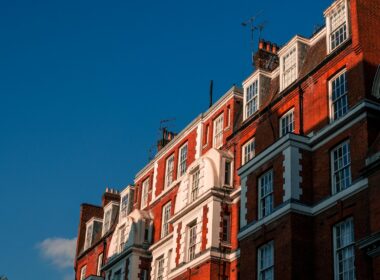 brown and white concrete building under blue sky during daytime